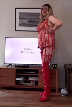 sissy in red lingerie and thigh boots         