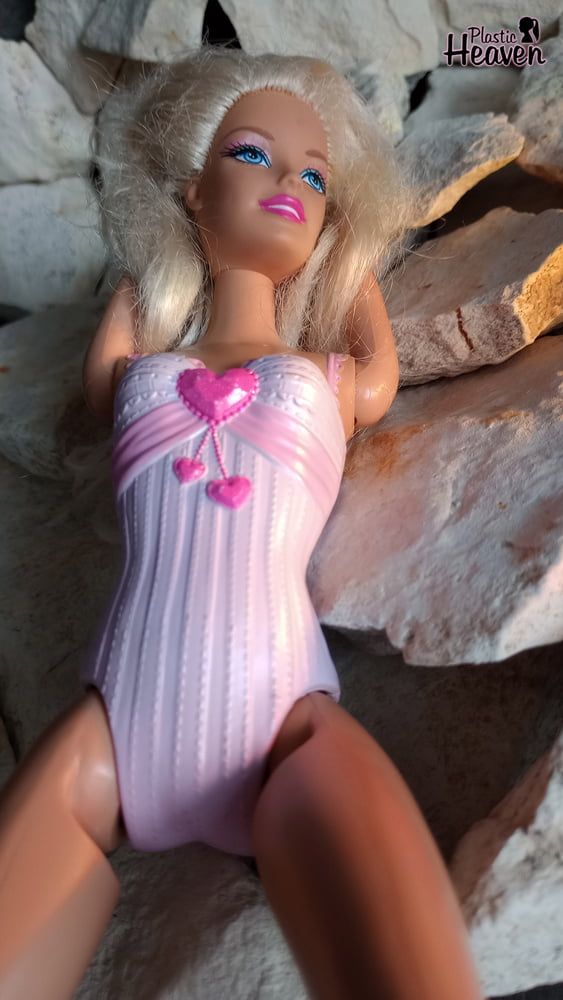 Barbie sunbathes after swimming in the ocean #5