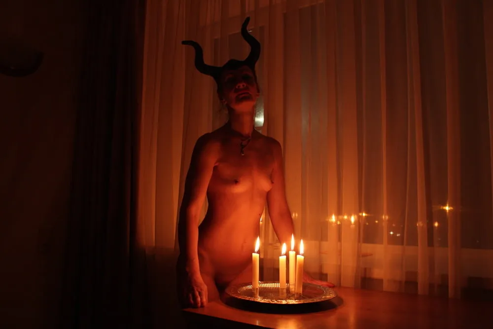 Naked Maleficent with Candles