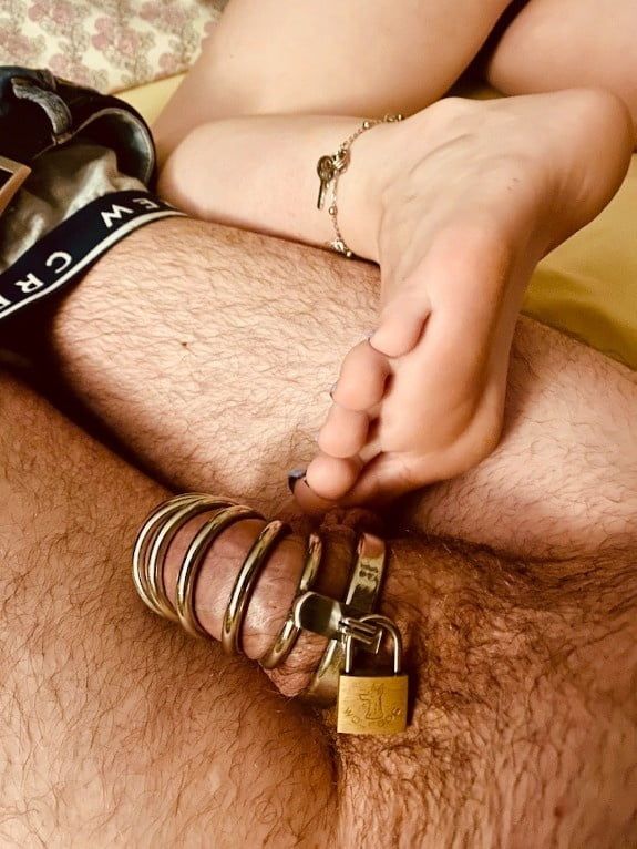 Chastity foot slave in his cage