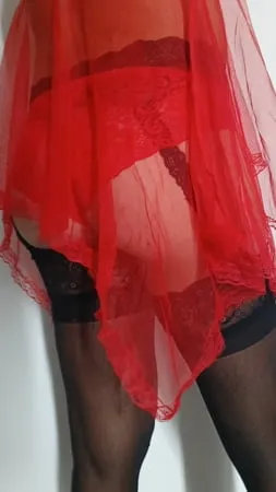 red nightie black stoking high heels         