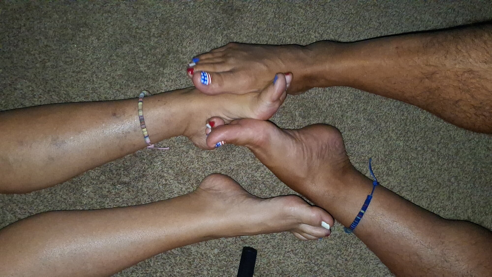 Playing footsie with our oiled feet #4
