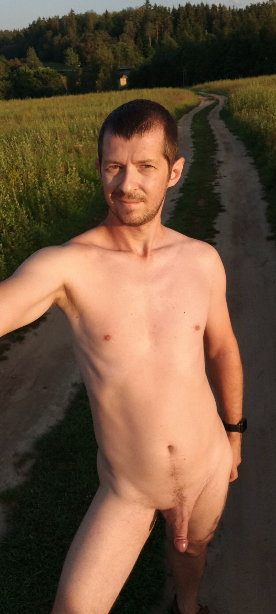 Naked nudist guy in nature #15