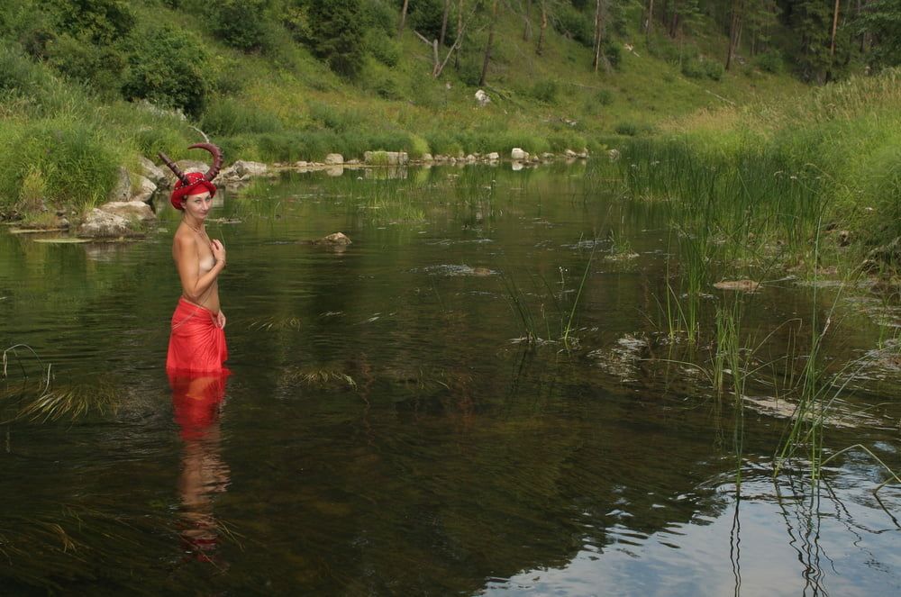 With Horns In Red Dress In Shallow River #6