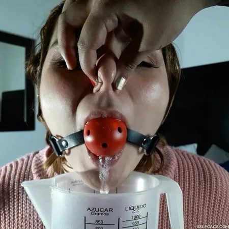 beautiful bitch ball gagged and drooling         