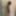 Dark-haired cutie gets naked and poses for you