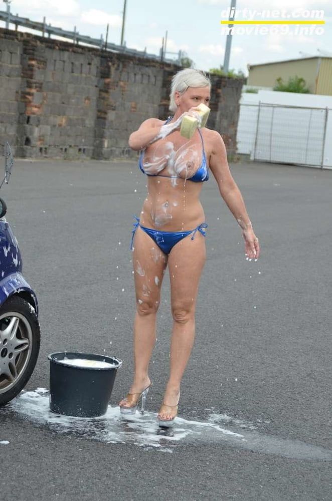 Jill Summer at the carwash in a bikini and topless #21