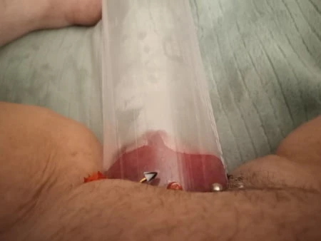 pumped clit with a penis poump         