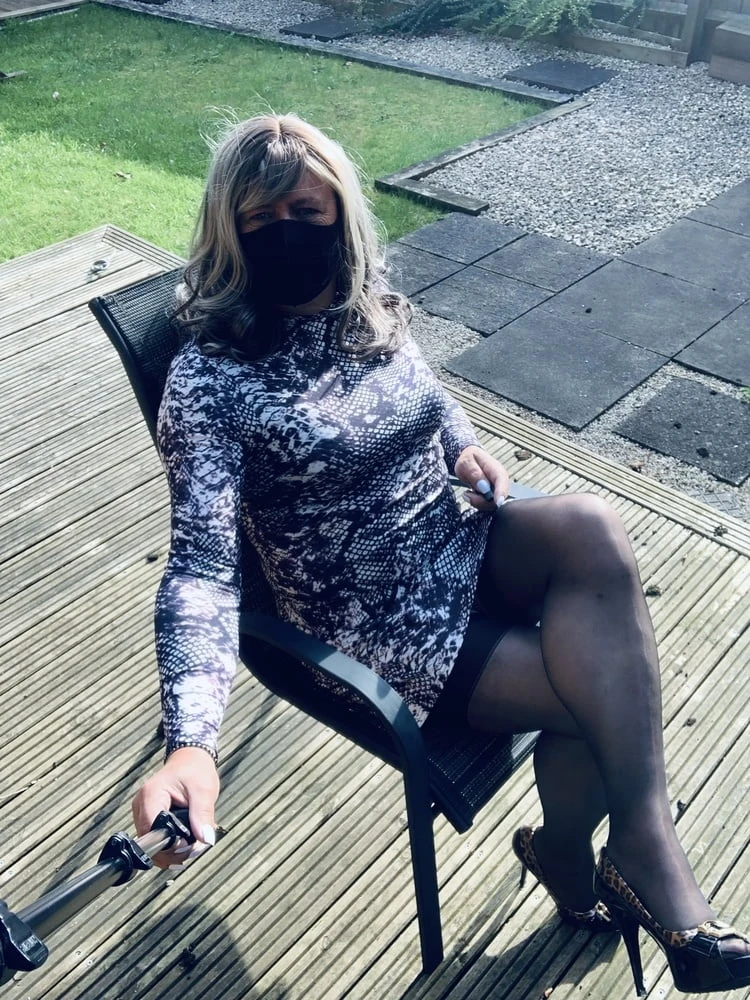 Kelly in snake skin pattern dress and black stockings  #27