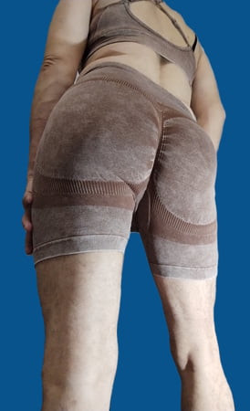  Sexy sissy poses in shorts and a fitness top