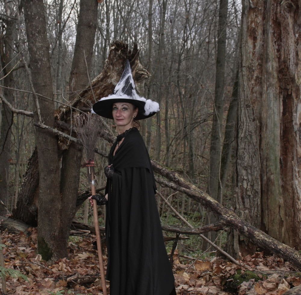 Witch with broom in forest #38