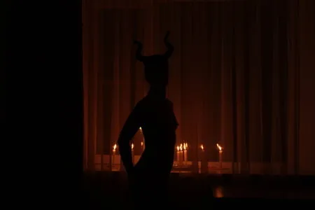 naked maleficent with candles         