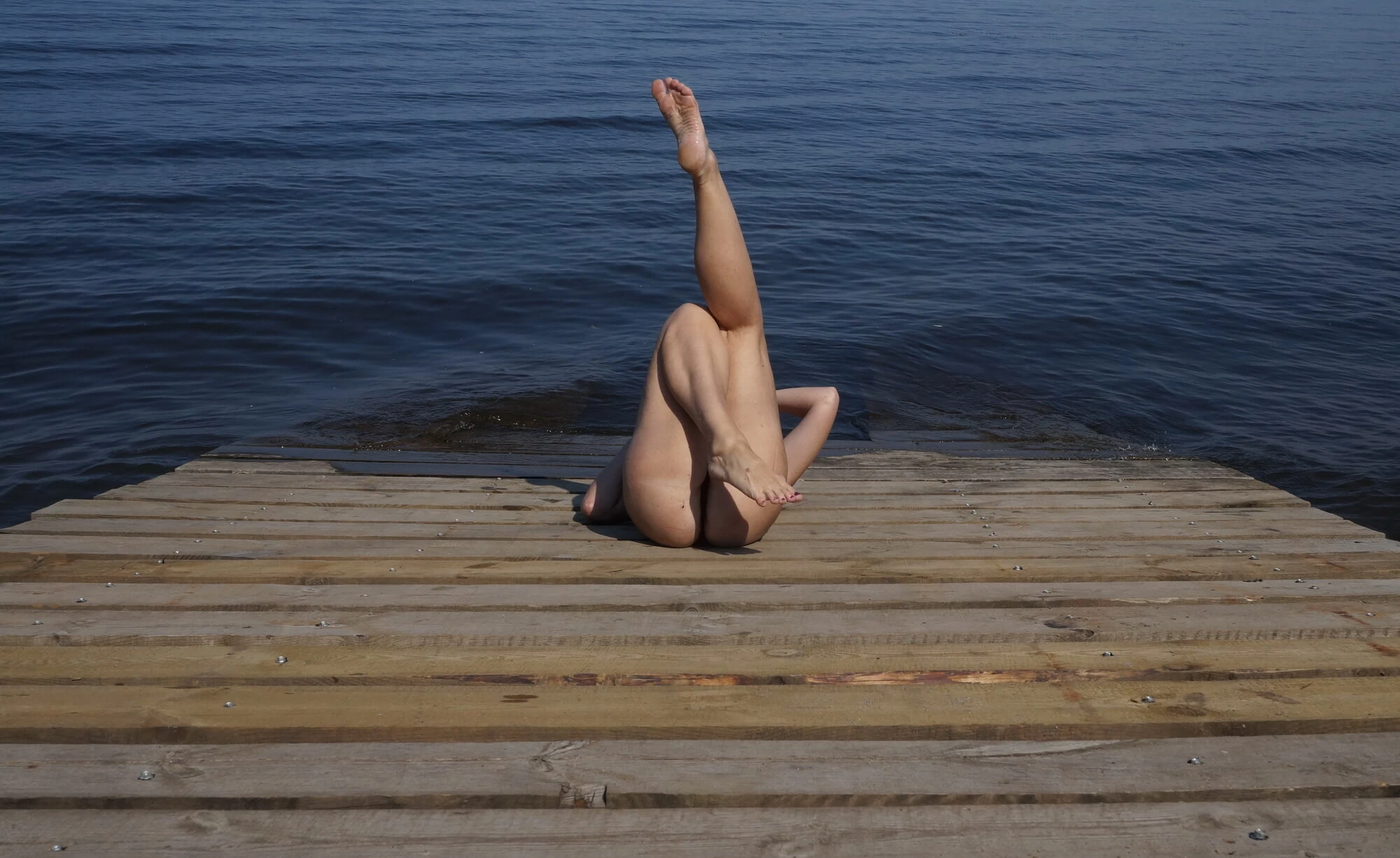 Legs play on a wooden platform #16