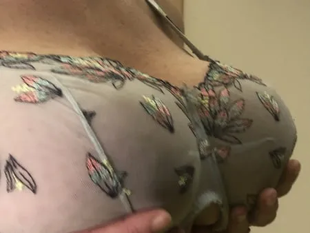 my wifes heavy big titts in bra         