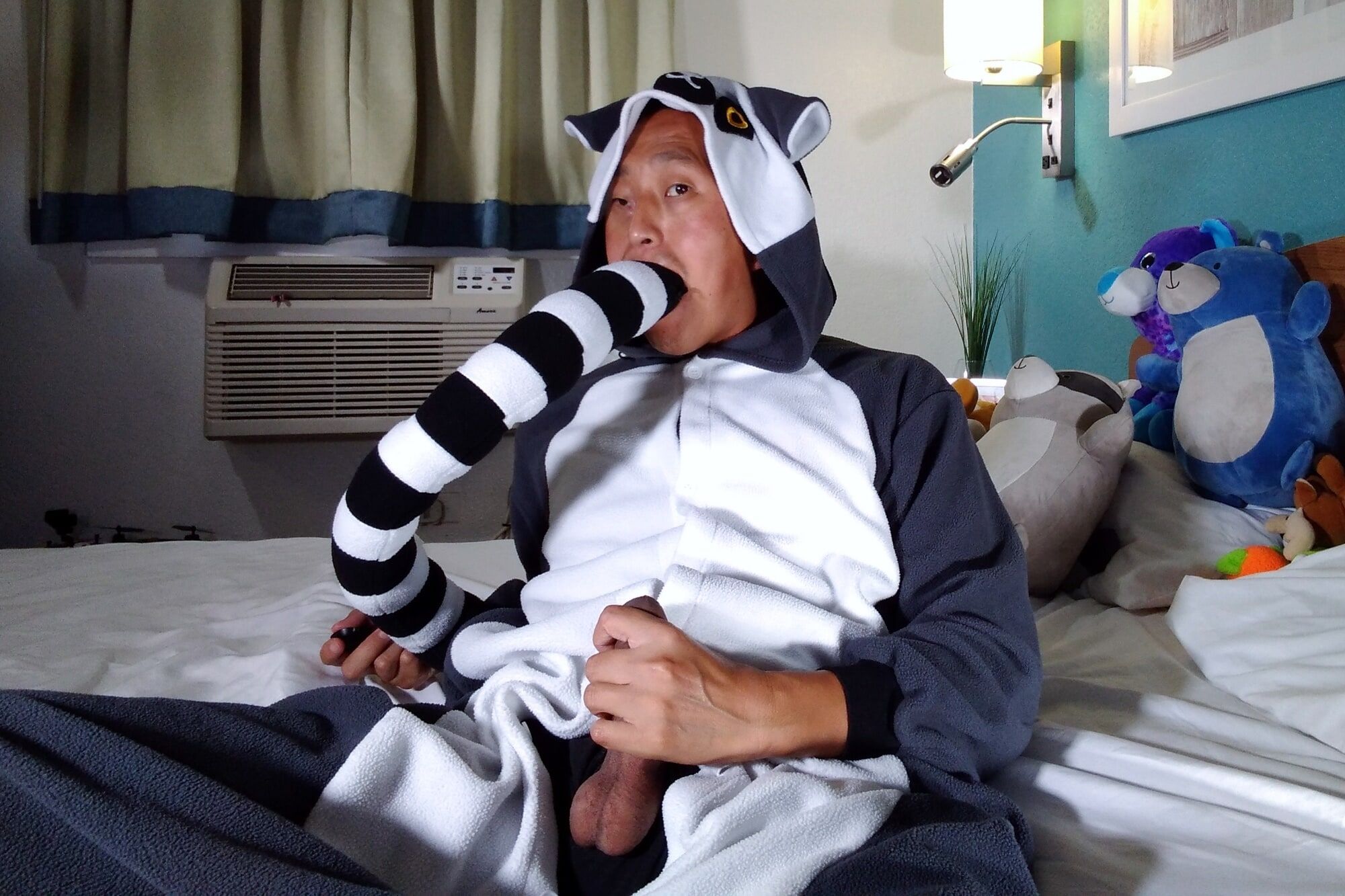 Hot asian boy wearing furry onesies and shiny undies