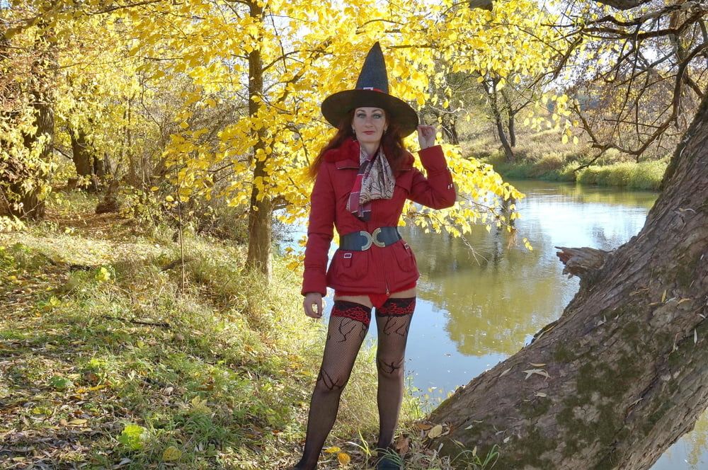 In Hat on Yellow Leaves Background