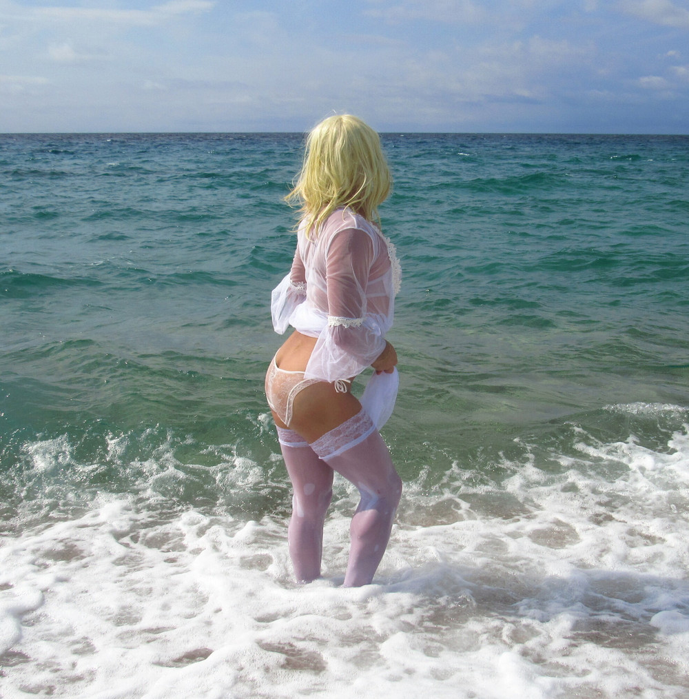 Sexy MILF Blonde shows off her ass on the beach. #45