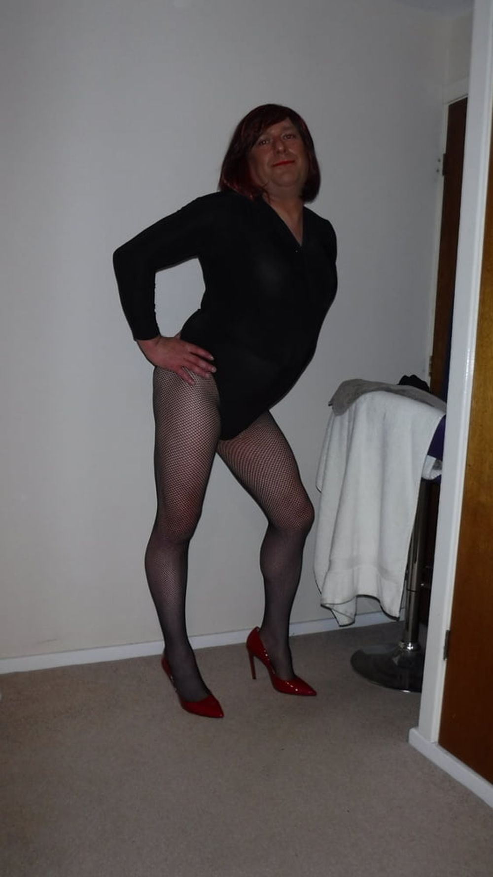 SISSY ROSIE IN FISHNET, RED HEELS AND BODYSUIT #15