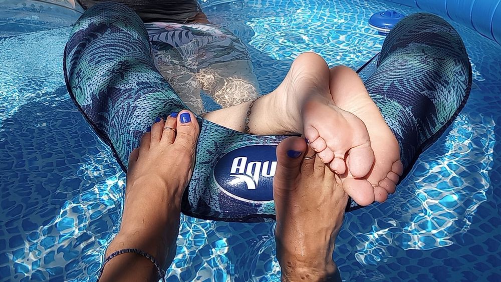 Our feet in the pool #13