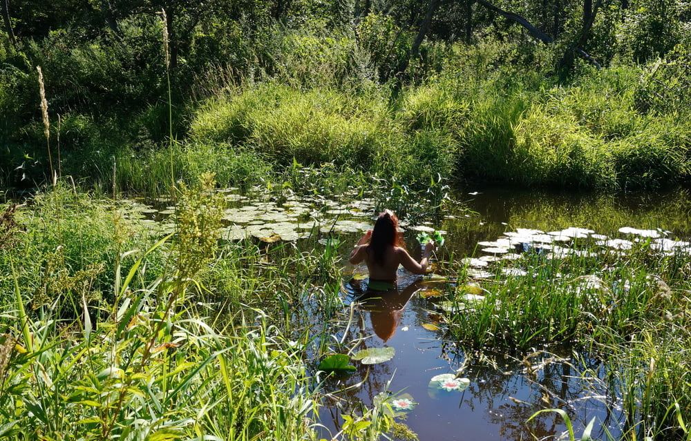 in a weedy pond #16