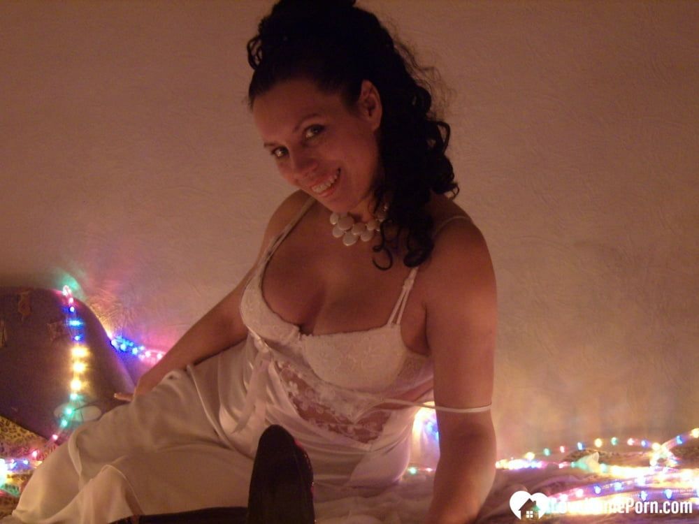 Wife in a wedding dress using her toy #21