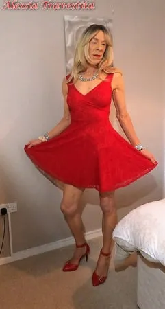    alessia travestita in flirty red dress         