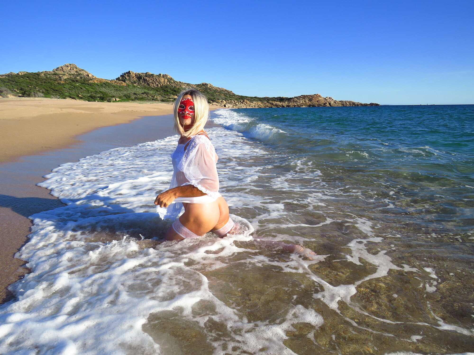 Sexy MILF Blonde shows off her ass on the beach. #19