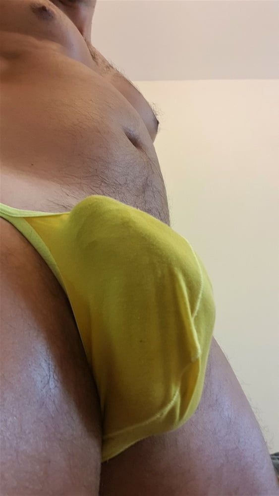 Tanned stud in yellow briefs  #9
