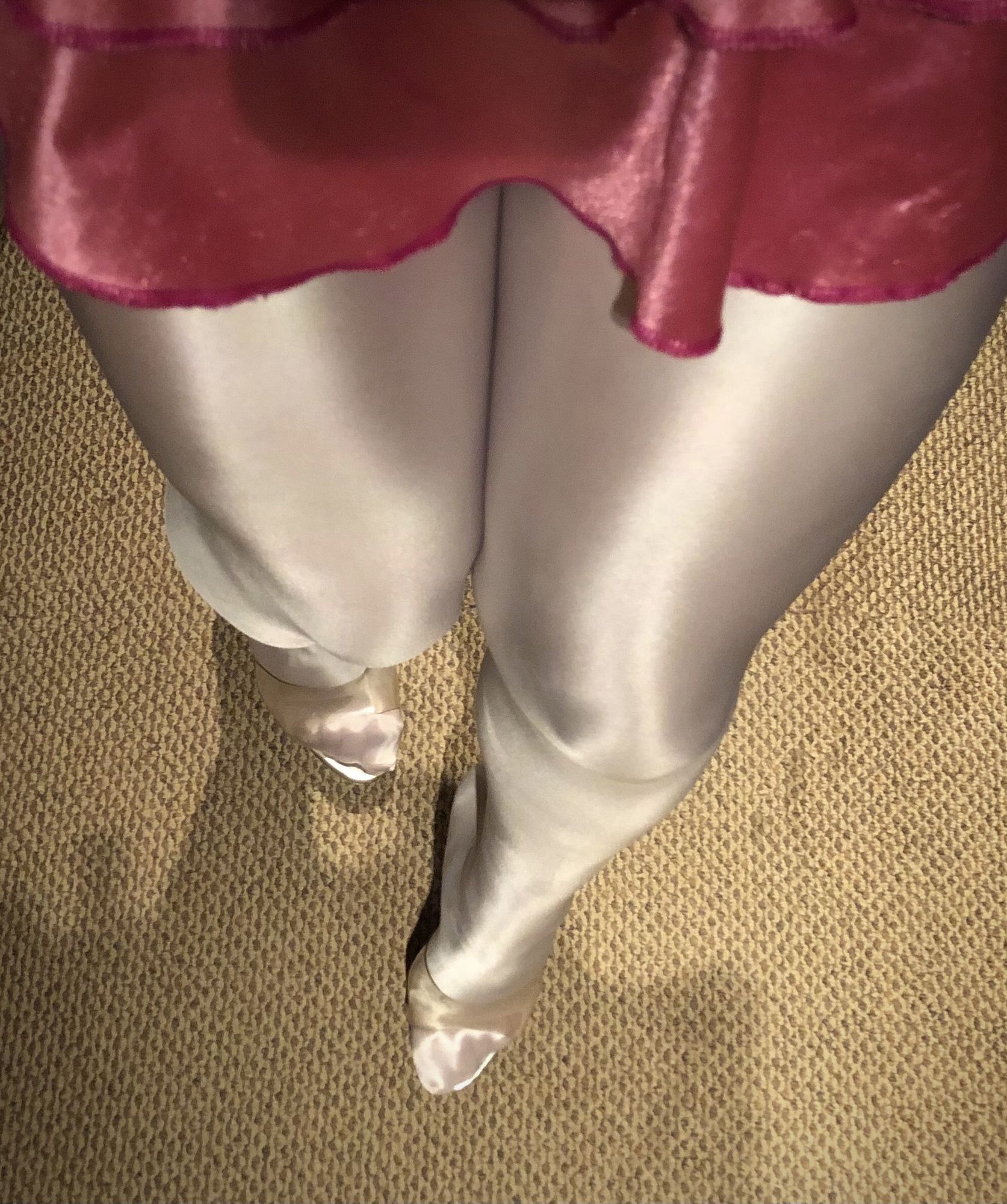 So brighty white glossy tights and super high heels.