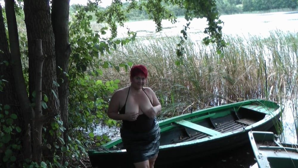 Big tits showing at the lake :-))