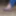 Dirty Bare Feet and Flip Flops Under the Chair