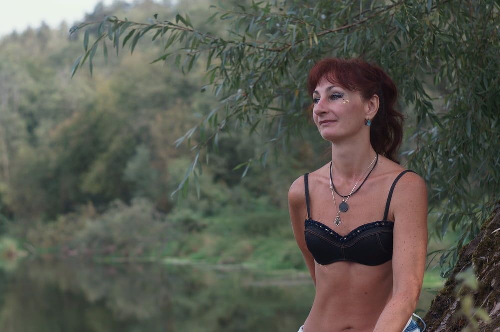 Black bikini near tree upon river #15