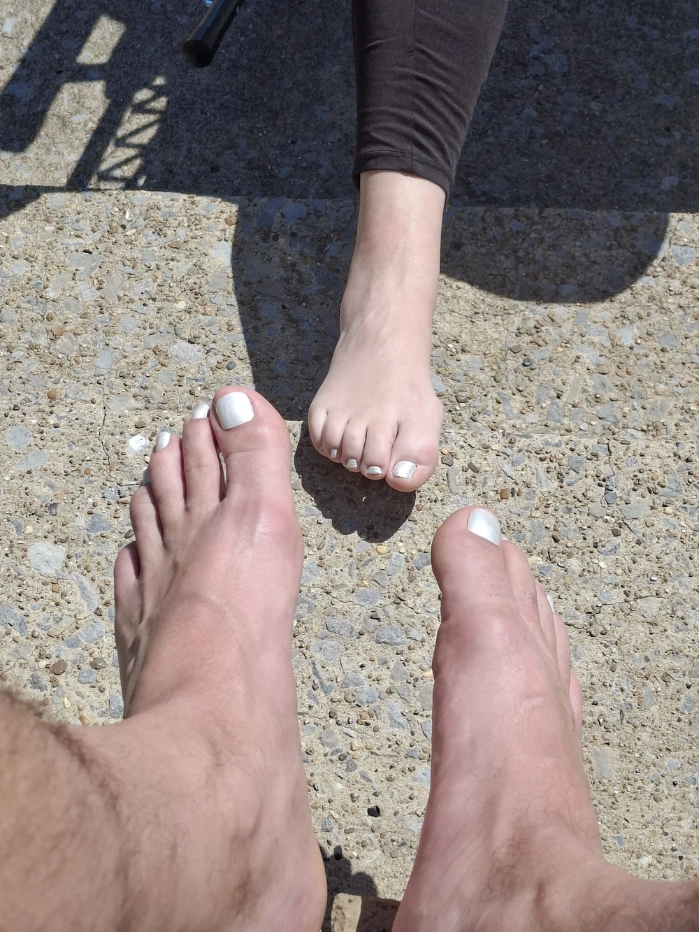 Relaxing outside showing our pedicured and painted toes #28