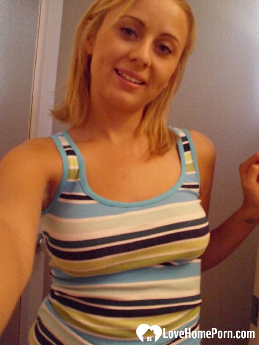 Curvy blonde has an amazing pair of breasts #3