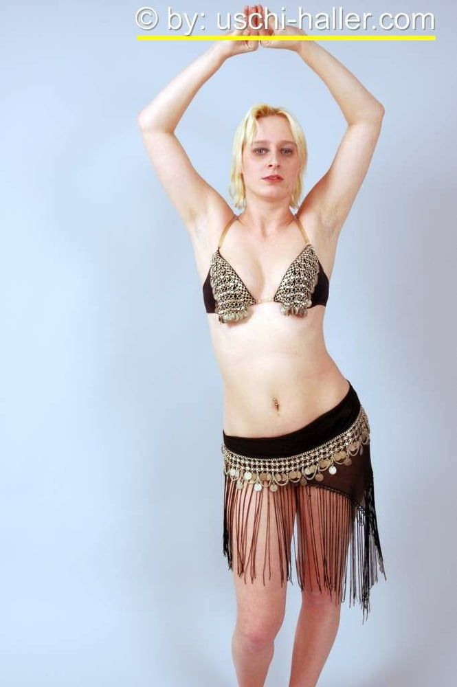 Photo shoot with blonde cum slut Dany Sun as a belly dancer #14