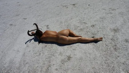 lying naked on the salt of the saltlake elton russia         