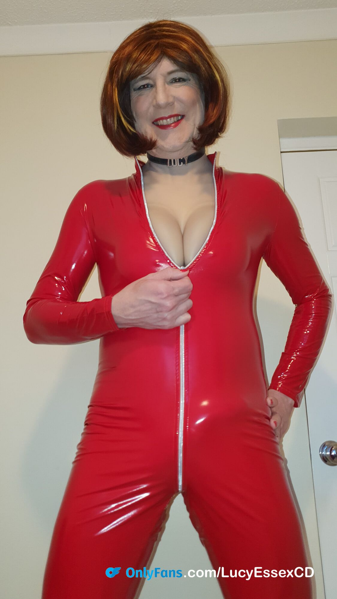 Huge cock TGirl Lucy masturbating in red PVC Catsuit #7
