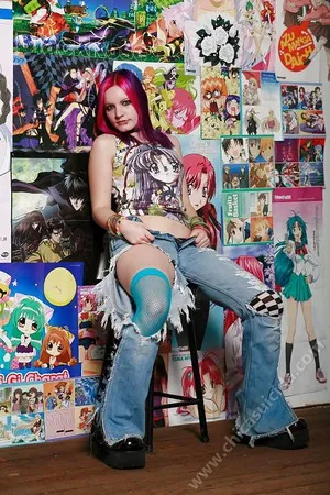 anime junkie girl doing strip tease        