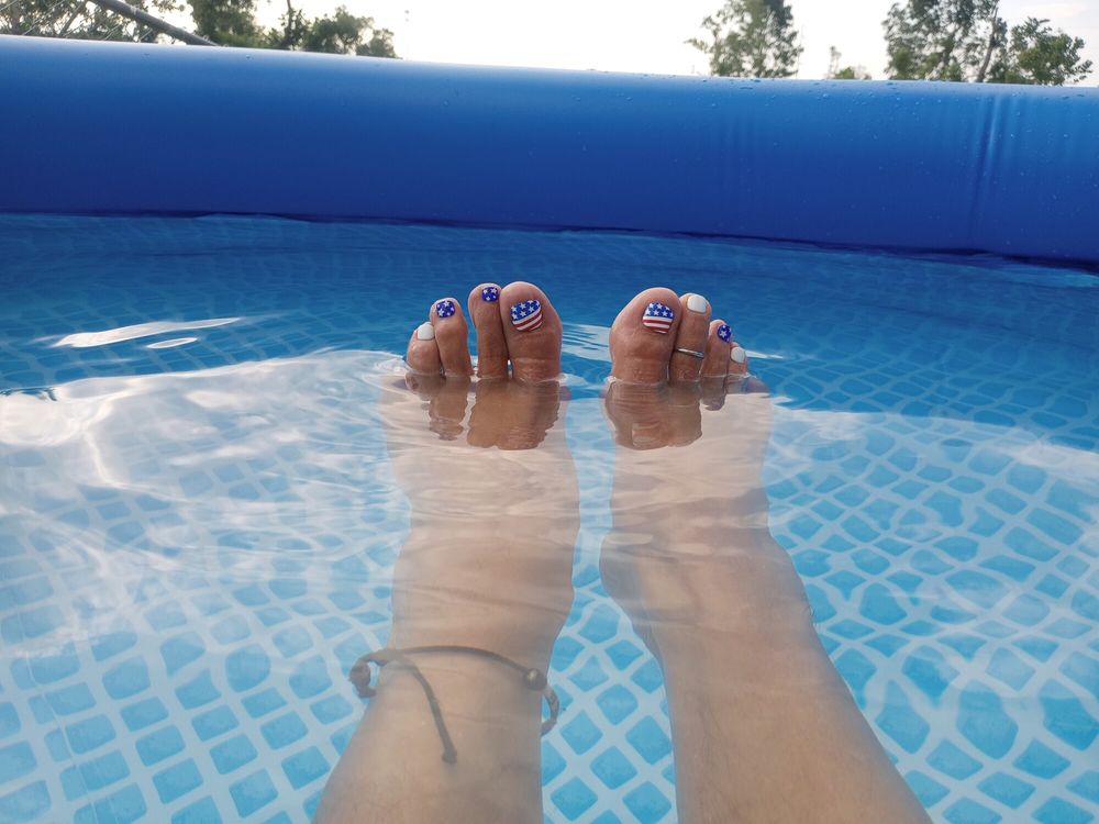 Showing off our wet  pedicured toes  #10