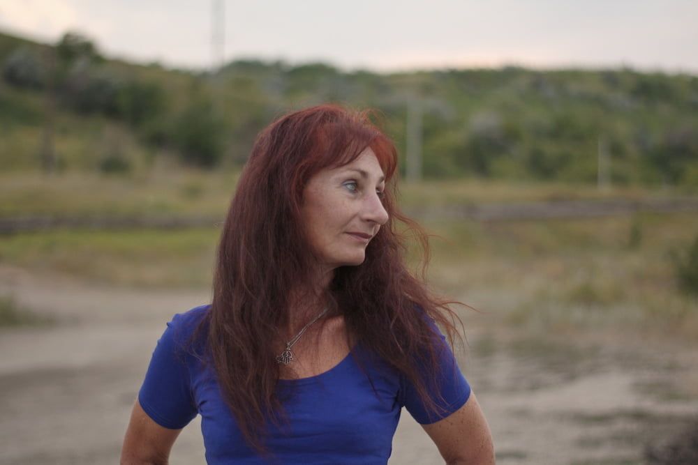 Evening potrait against the background of the river #7