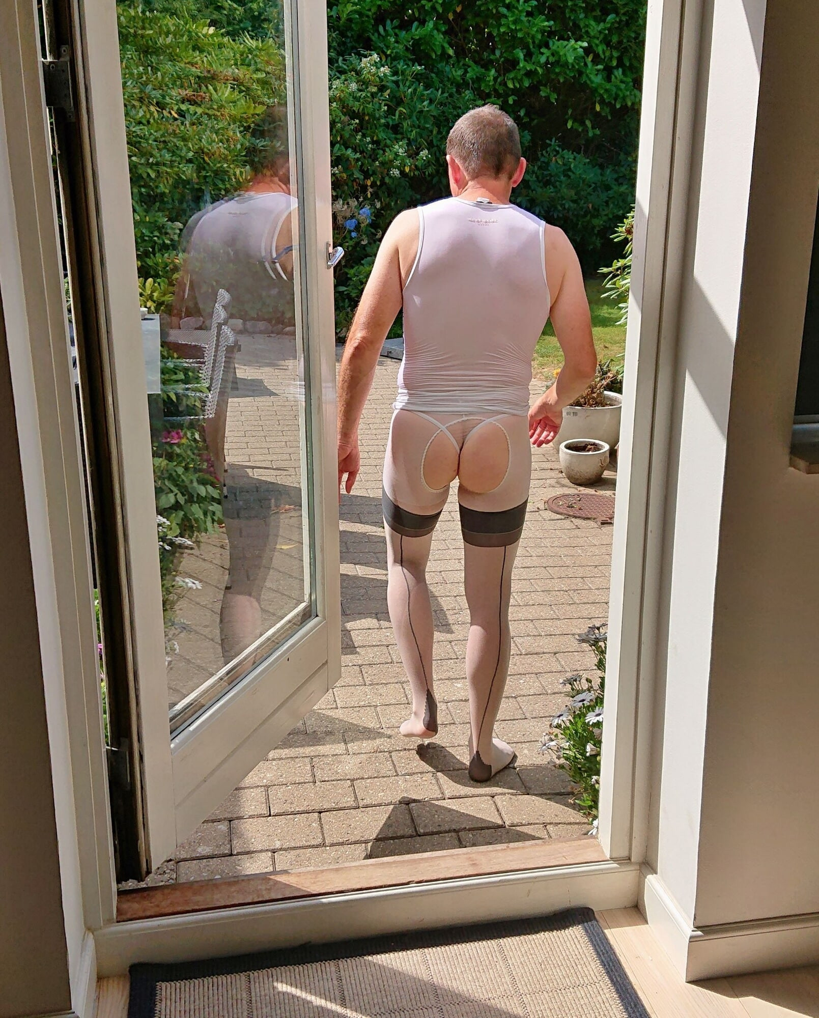 Outdoors in sheer nylon lingerie and seamed RHT nylons