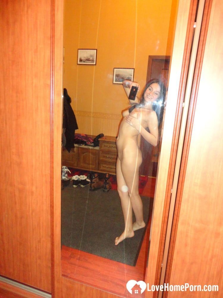 Hot teen shows her body in the mirror #8