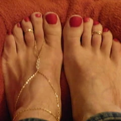 my feet in red polish, jewelry and heels