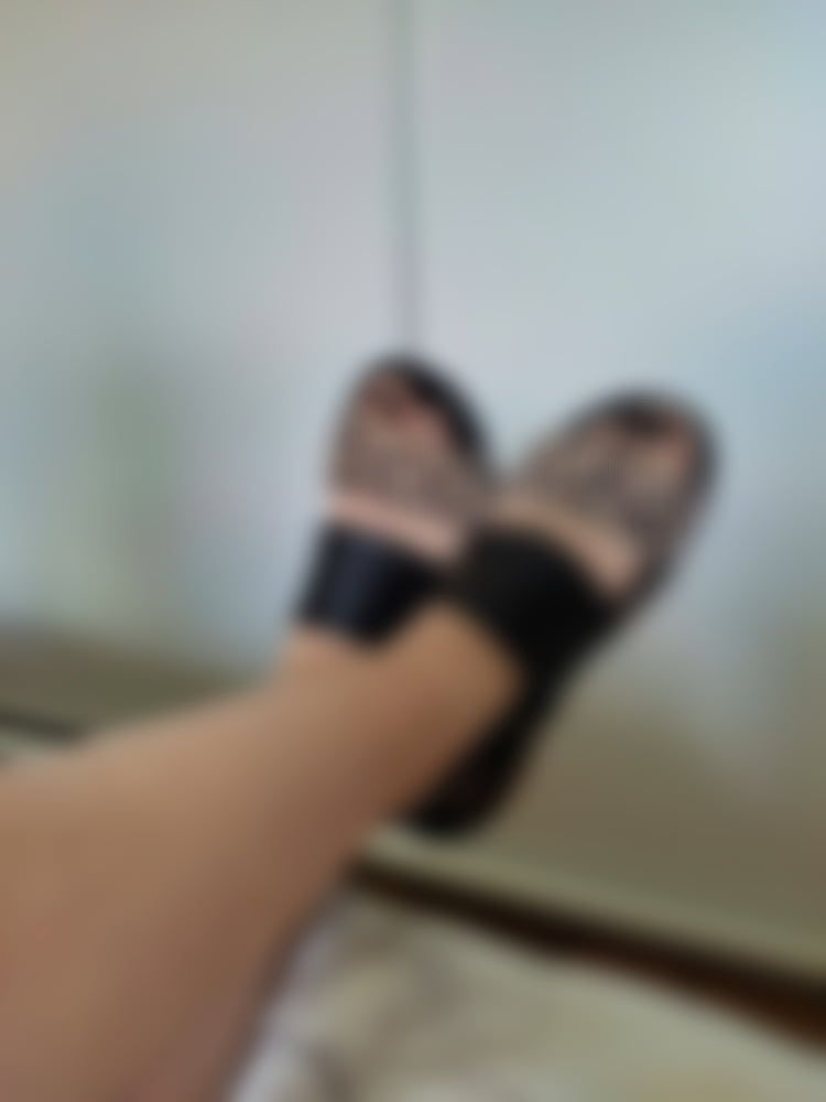 Black nails and black sandals 