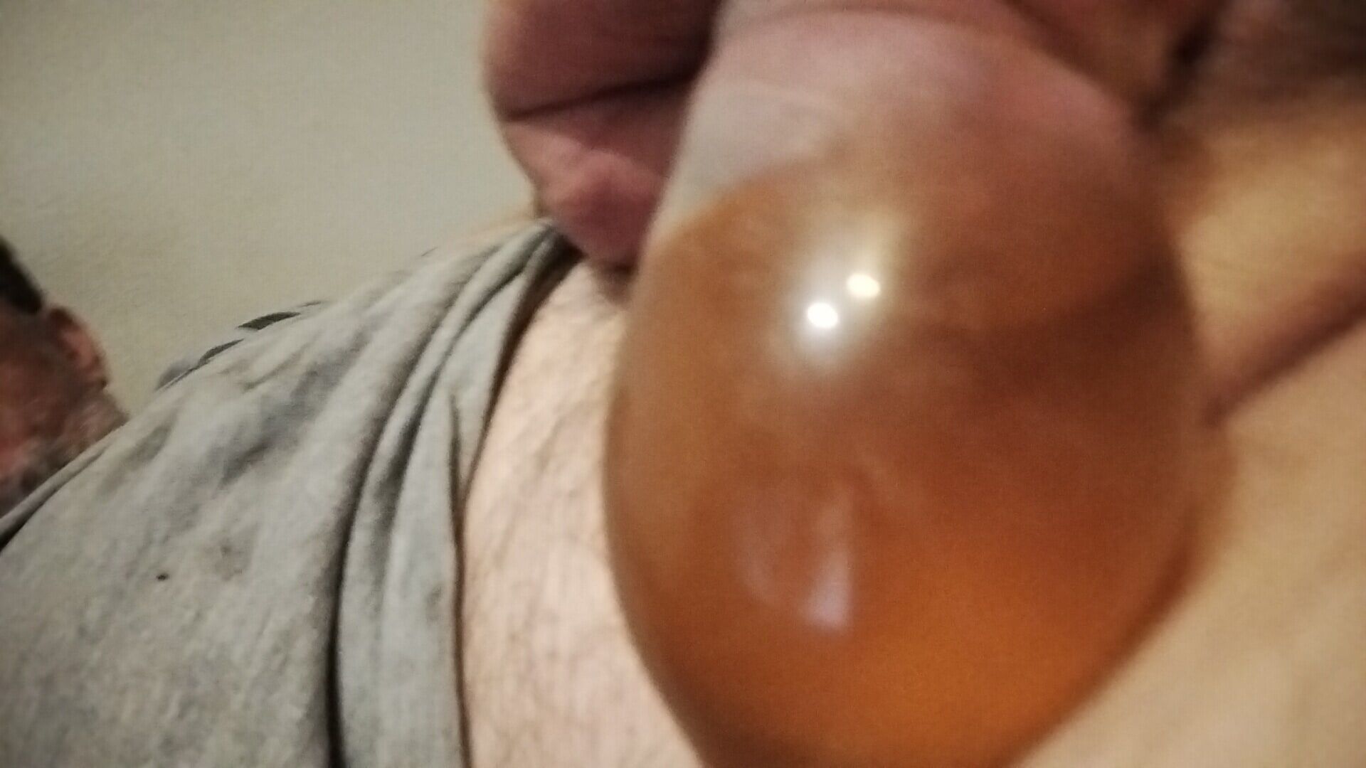 Putting a condom on and making myself fill it up with piss  #8