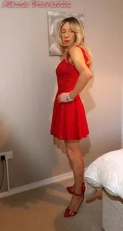    alessia travestita in flirty red dress         