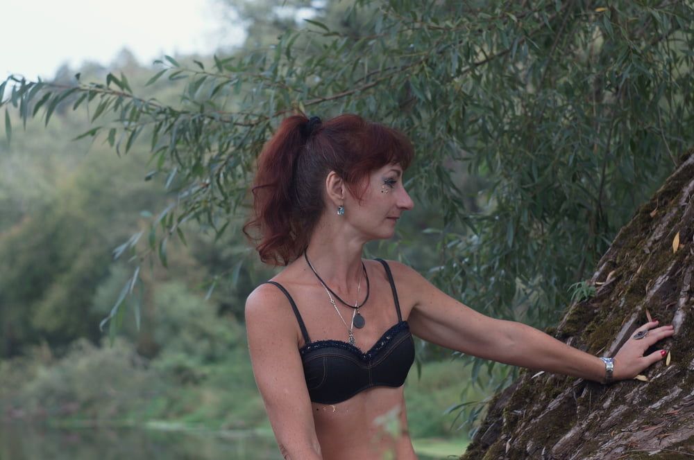 Black bikini near tree upon river #17