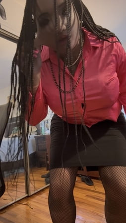Black Babe Danae wearing a sexy business skirt suit