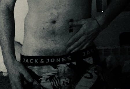 ME NUDE WITH A SCOTTISH SKIRT, SHAVED COCK AND ASS