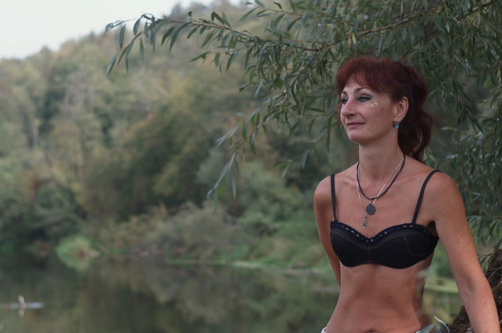 Black bikini near tree upon river #13